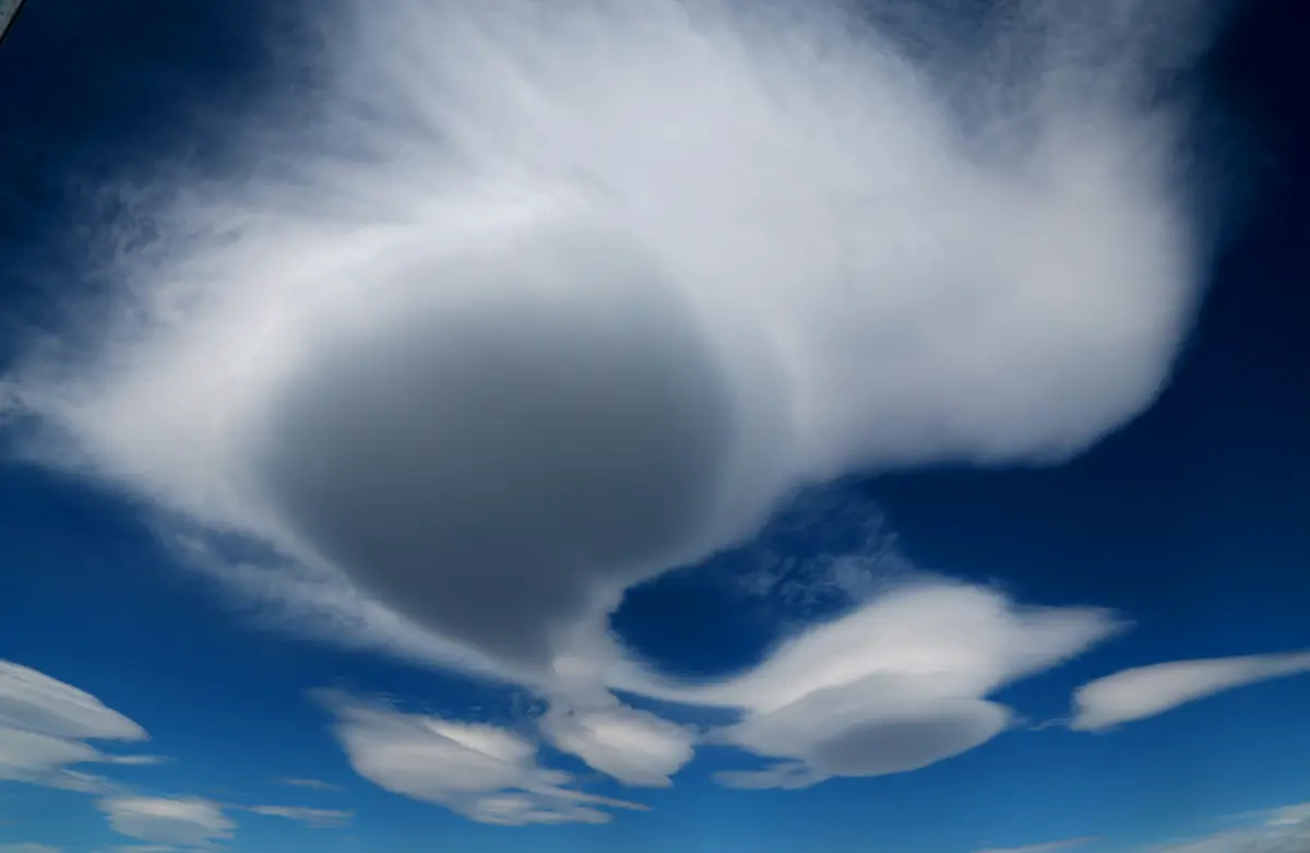 White clouds on a blue background